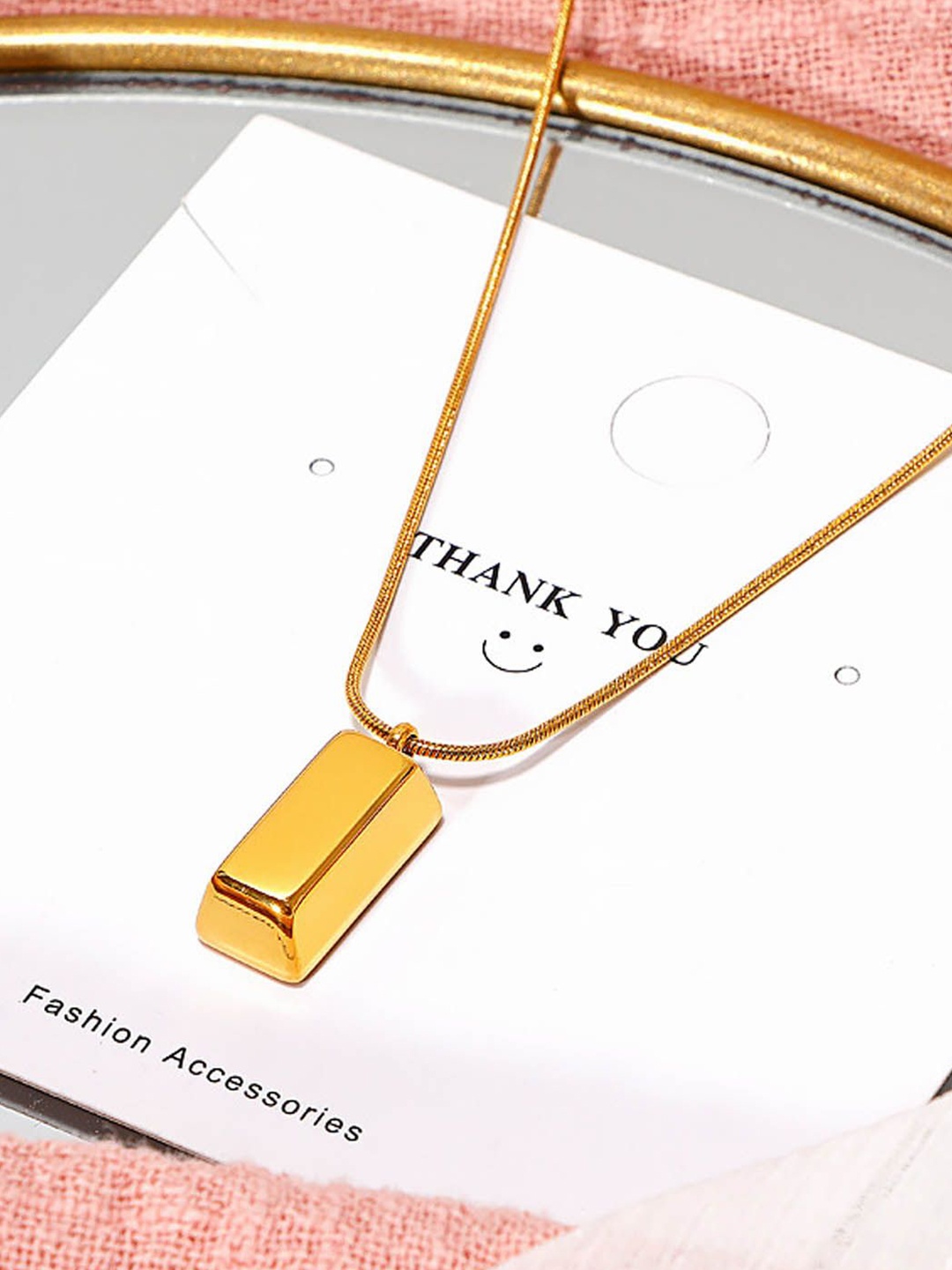 

StyleCast Gold Biscuit-Shaped Pendant with Chain