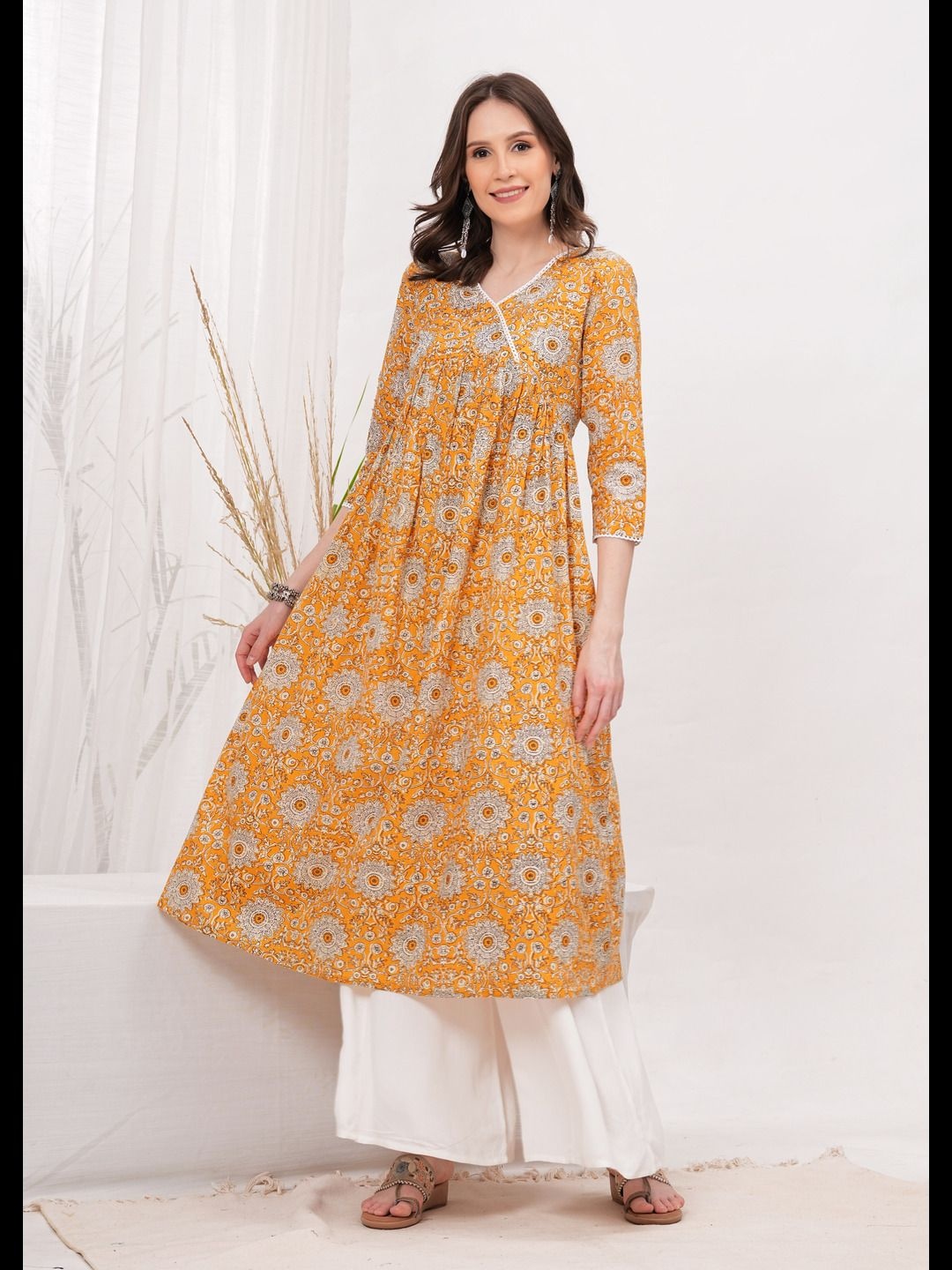 

Vilgi Floral Printed V-Neck Pleated Pure Cotton A-Line Kurta, Mustard