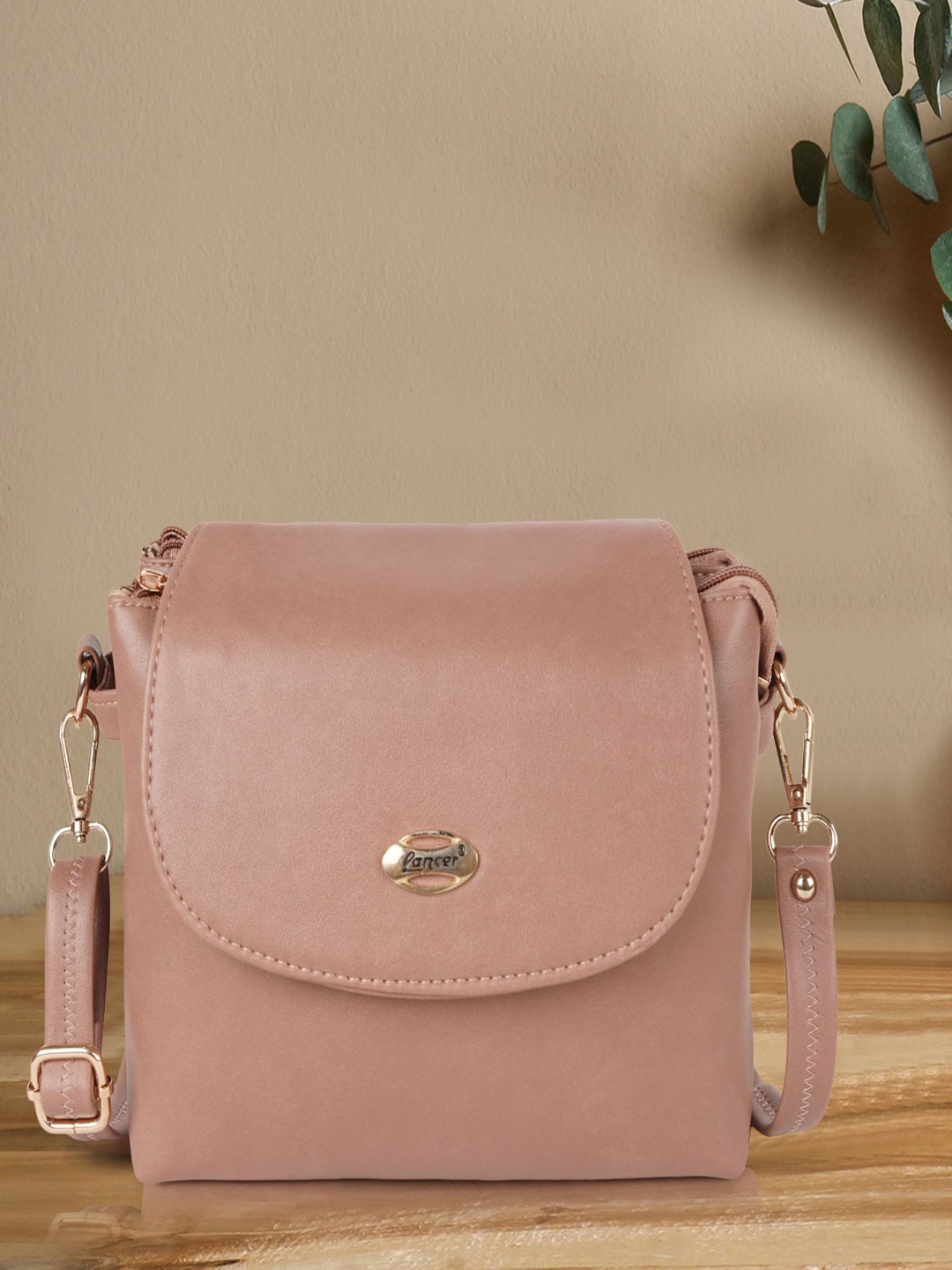 

Lancer Women Solid Structured Leather Sling Bag, Peach