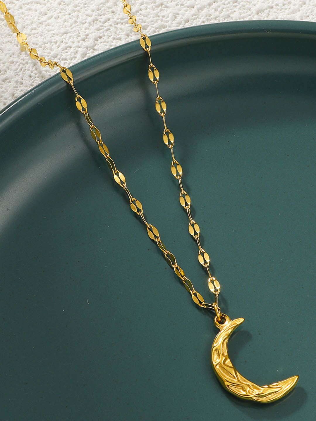 

StyleCast Gold-Toned Half Moon Shaped Pendant with Chain