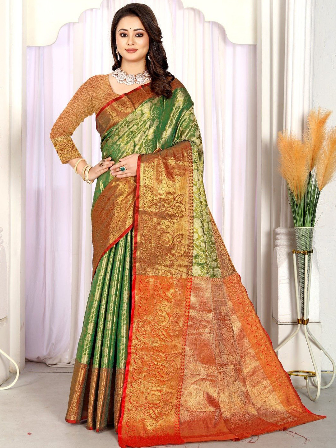 

Jhilmil Fashion Woven Design Zari Pure Silk Kanjeevaram Saree, Green