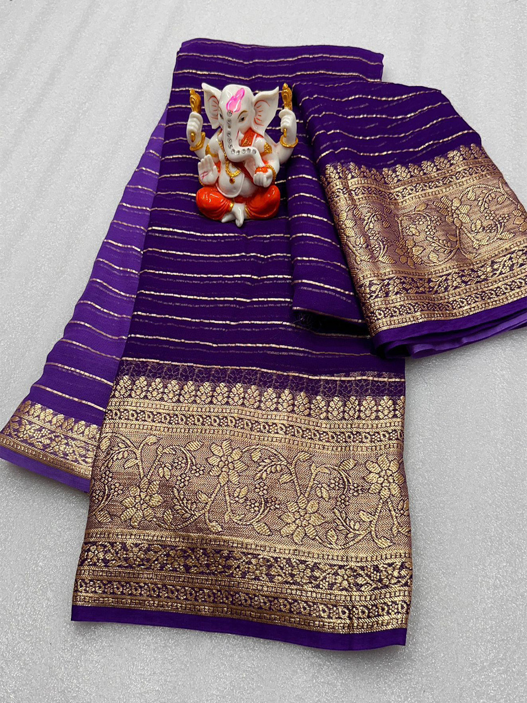 

PAYAL CREATION Striped Zari Pure Georgette Saree, Purple