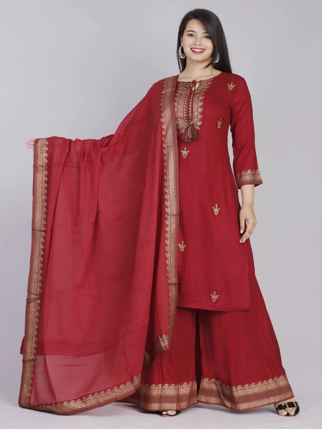 

Moda Rapido Ethnic Motifs Printed Sequinned A-Line Kurta with Sharara And Dupatta, Maroon