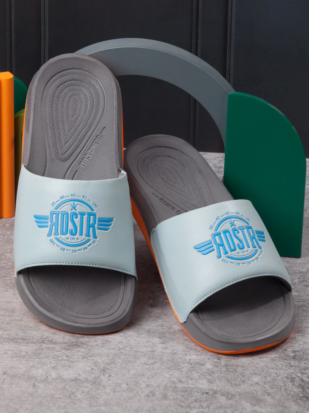 

The Roadster Lifestyle Co Men Graphic Printed Sliders, Teal