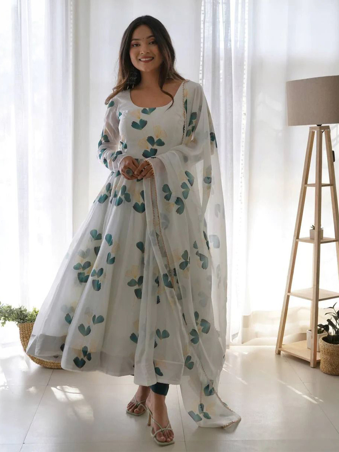 

Lakshya Fashion Mart Women Floral Printed Empire Kurta with Trousers & With Dupatta, White