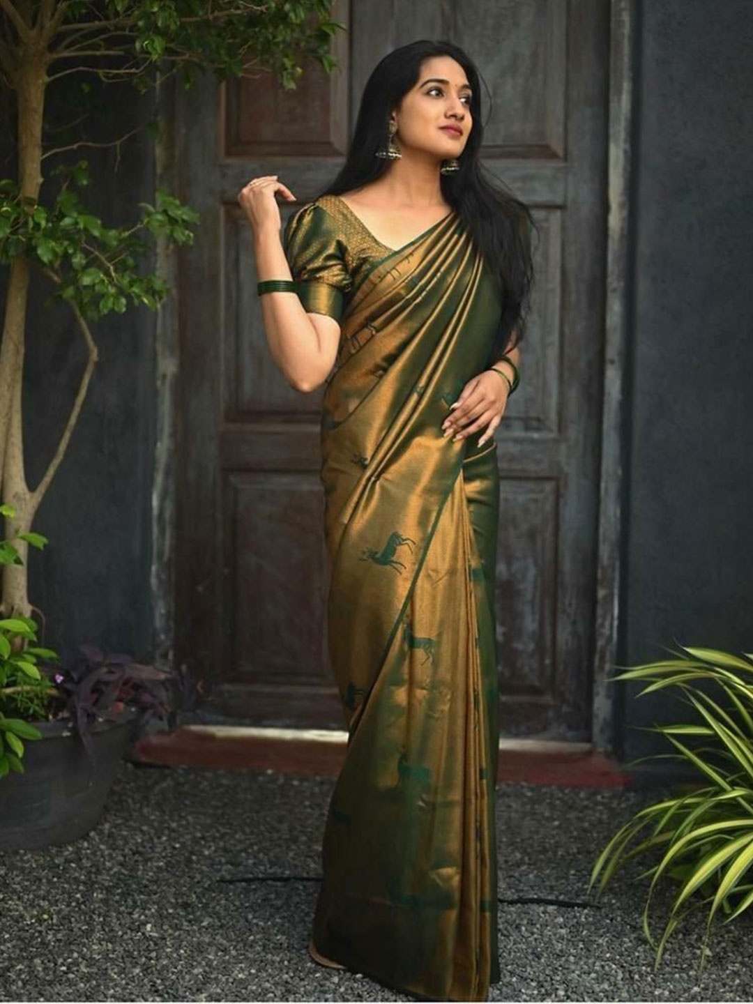 

Upalksh Ethnic Motifs Woven Design Zari Cotton Silk Saree, Green