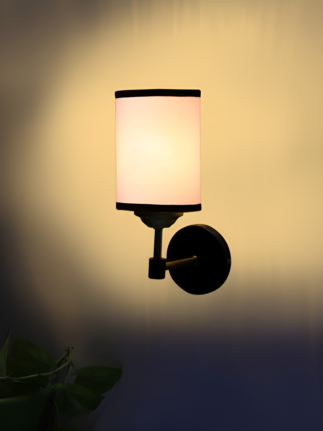 

Devansh White Metal Traditional Cylinder Shaped Wall Lamp