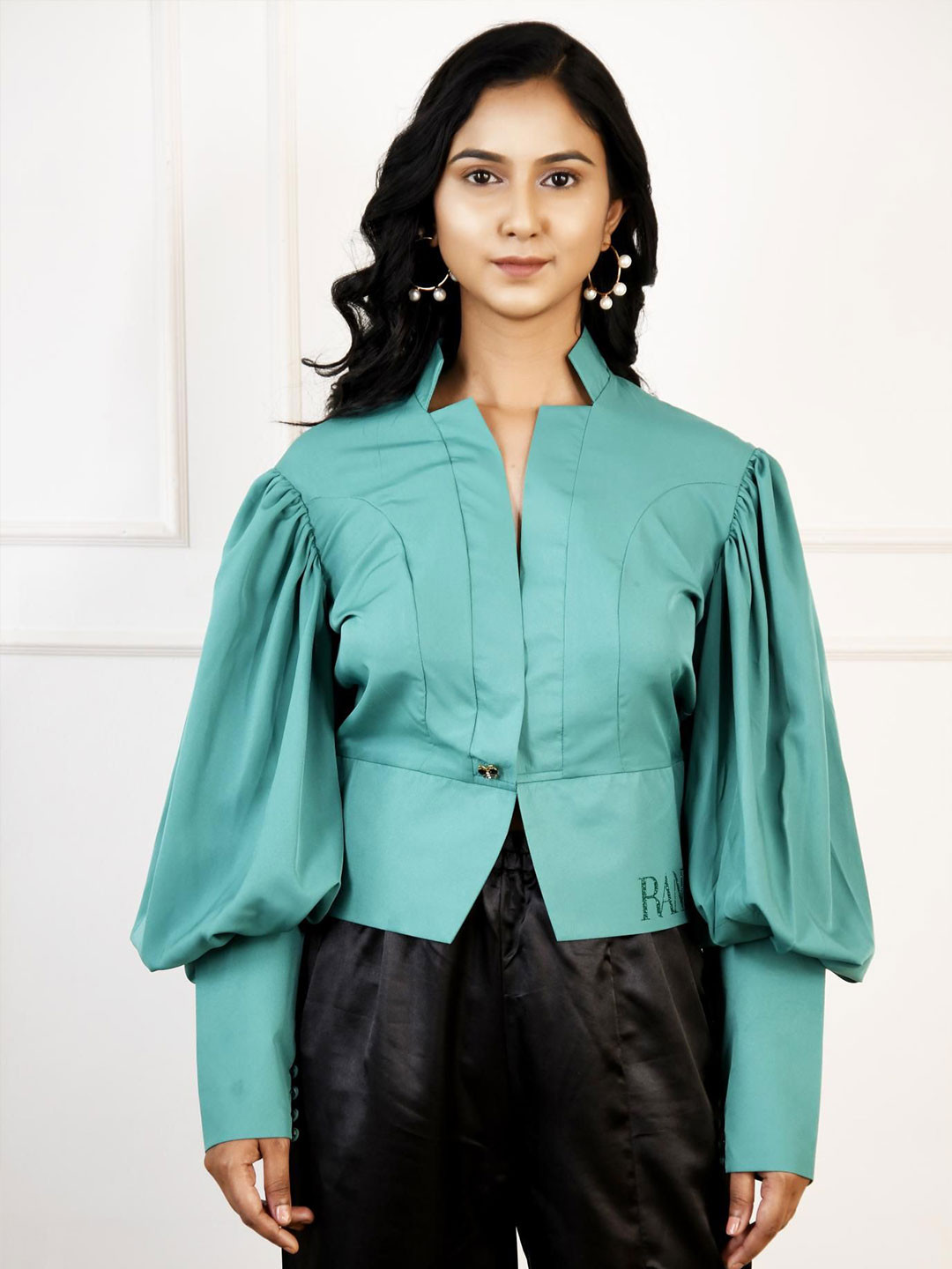 

RANJ Top Having Baggy Bishop Sleeve And Long Cuff With A Coat Collar And Fitted Hem., Green