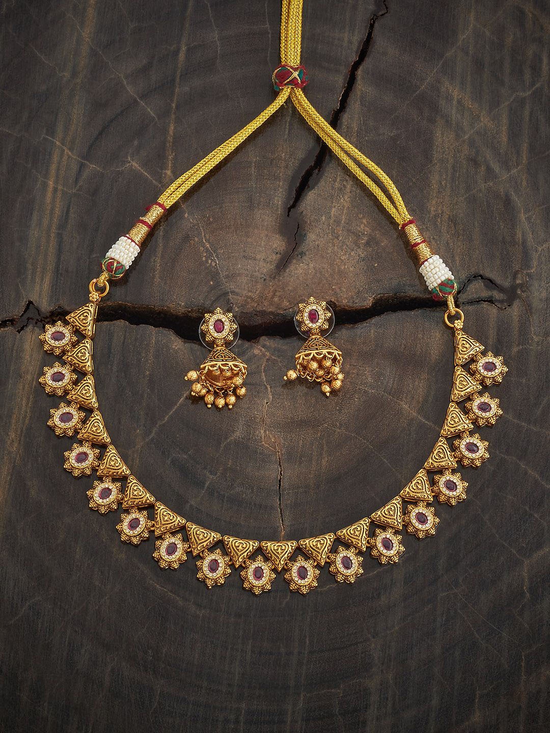 

Kushal's Fashion Jewellery Ruby Gold-Plated Ethnic Antique Jewellery Set