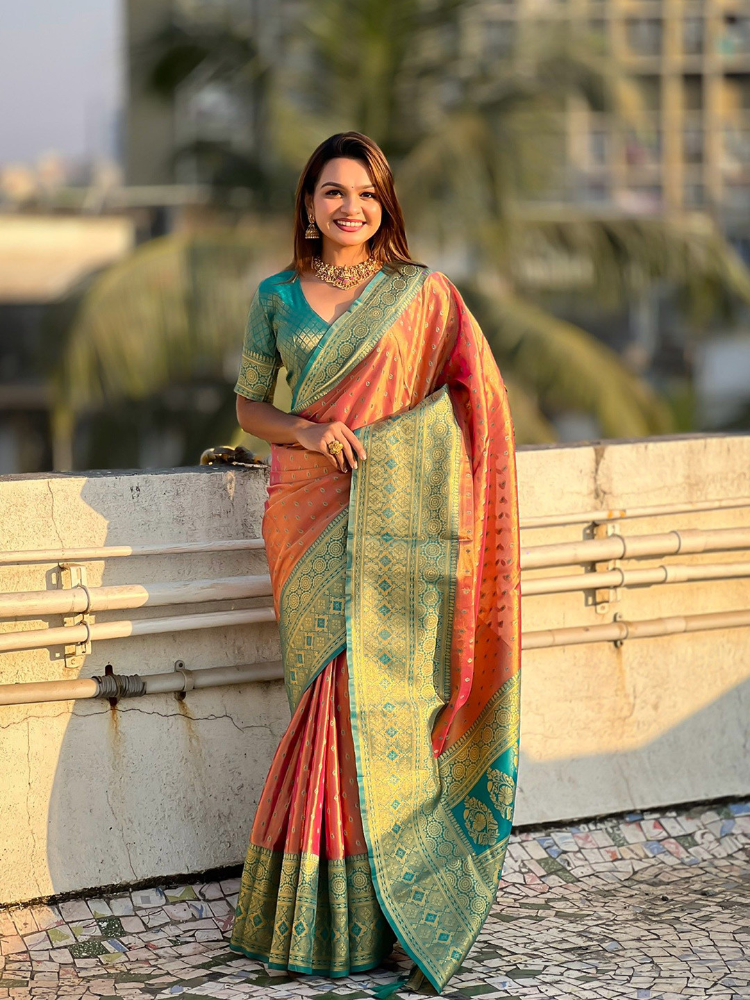 

Rangtulika Ethnics Motifs Woven Design Zari Saree, Orange