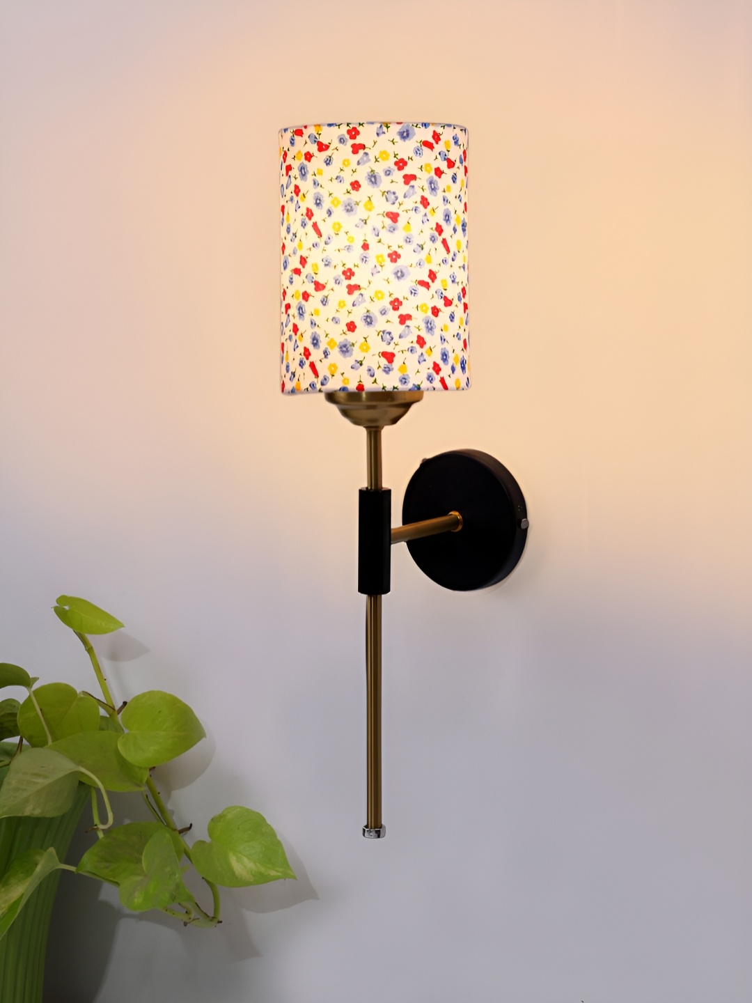 

Devansh White & Blue Printed Metal Traditional Abstract Shaped Shaped Wall Lamp