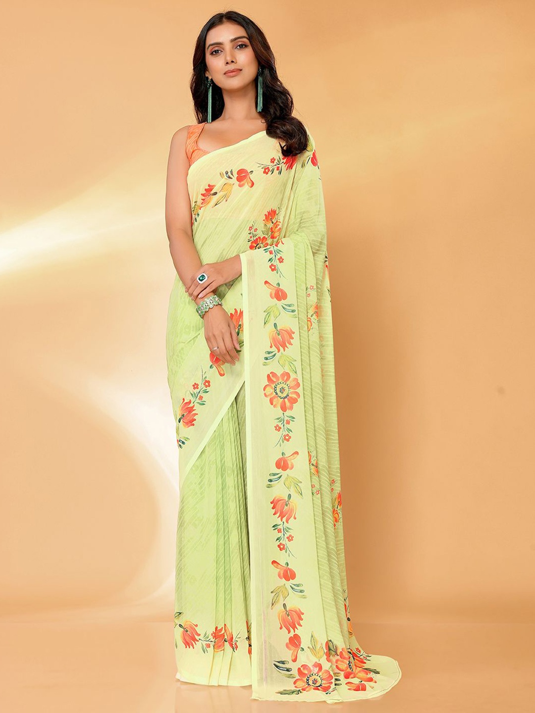 

Janasya Women Light Green Georgette Floral Printed Saree with Unstitched Blouse Piece