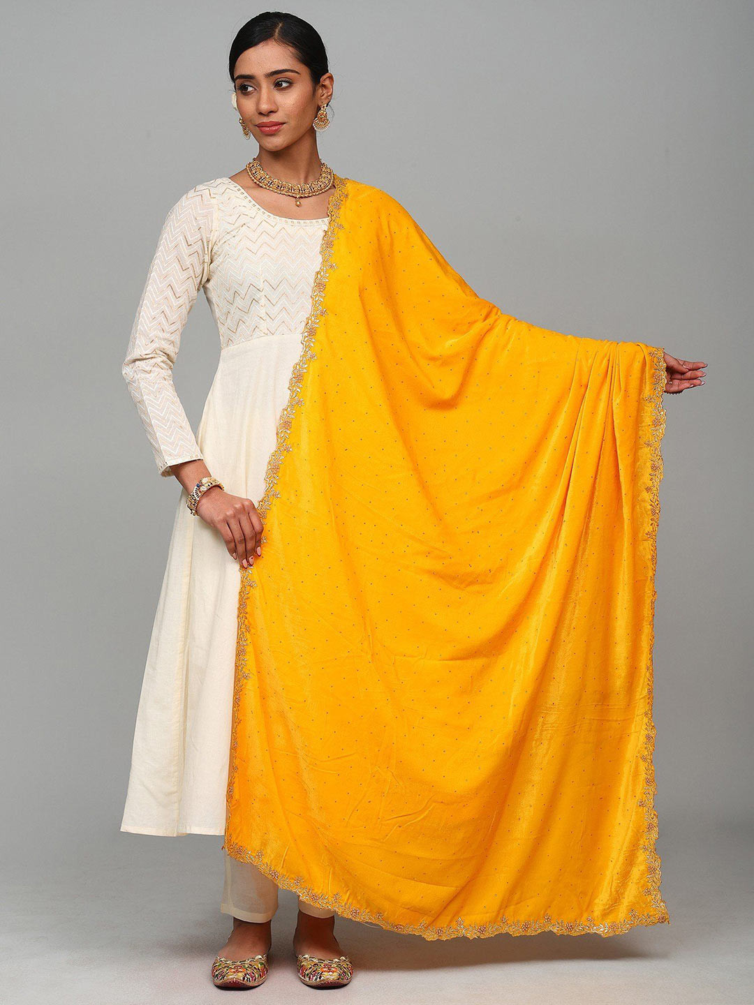 

Exotic India Embroidered Velvet Dupatta, Yellow