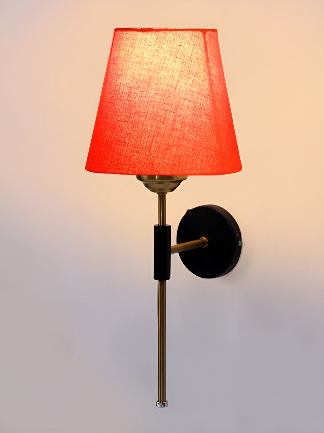 

Devansh Orange & Gold-Toned Metal Traditional Abstract Shaped Shaped Wall Lamp