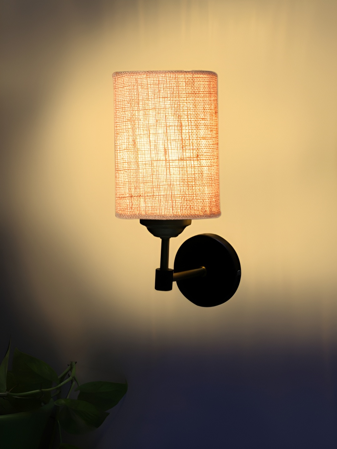 

Devansh Beige Textured Metal Traditional Cylinder Shaped Wall Lamp