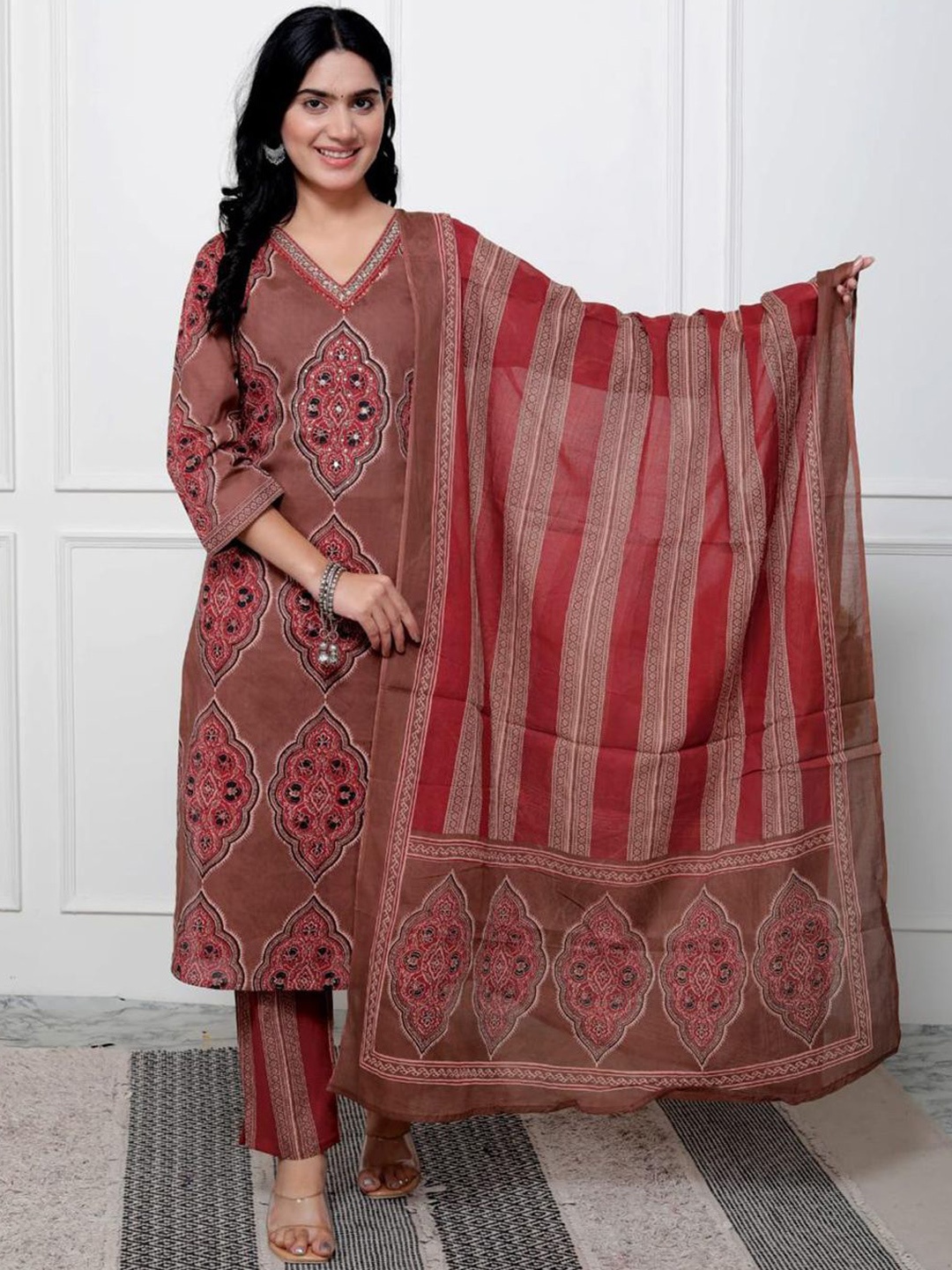 

Meena Bazaar Ethnic Motifs Printed Regular Mirror Work Kurta With Trousers & Dupatta, Brown