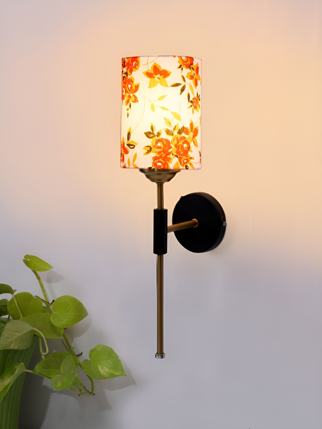 

Devansh White & Orange Metal Traditional Cylinder Shaped Wall Lamp