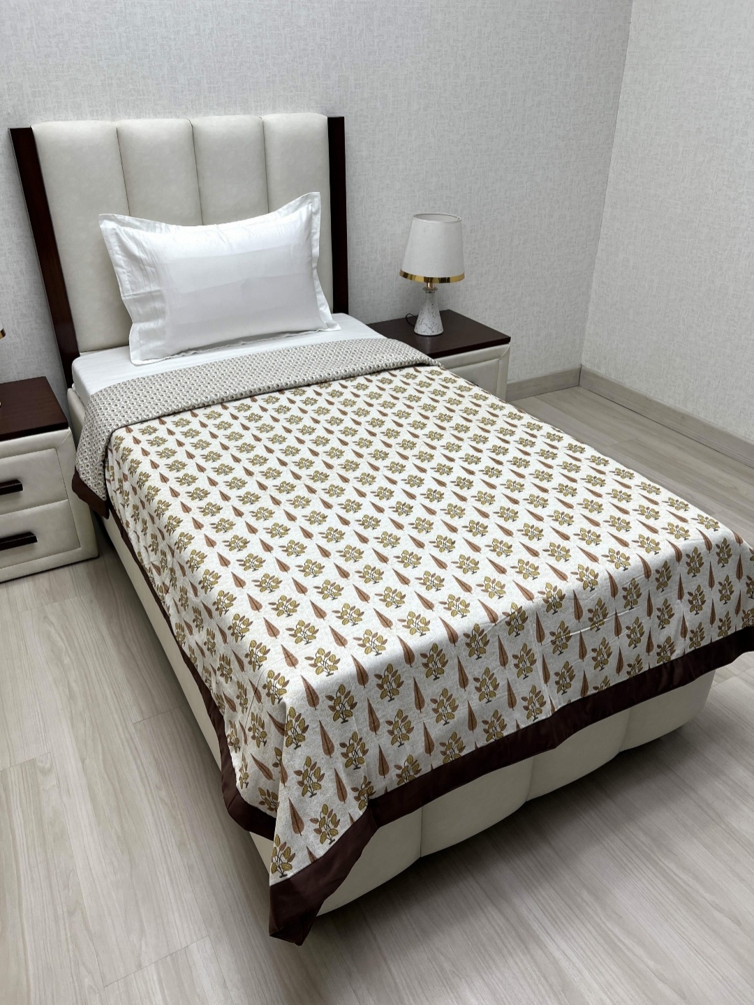 

Pure Decor Sole Silken White & Brown Floral Printed AC Room Single Bed Dohar