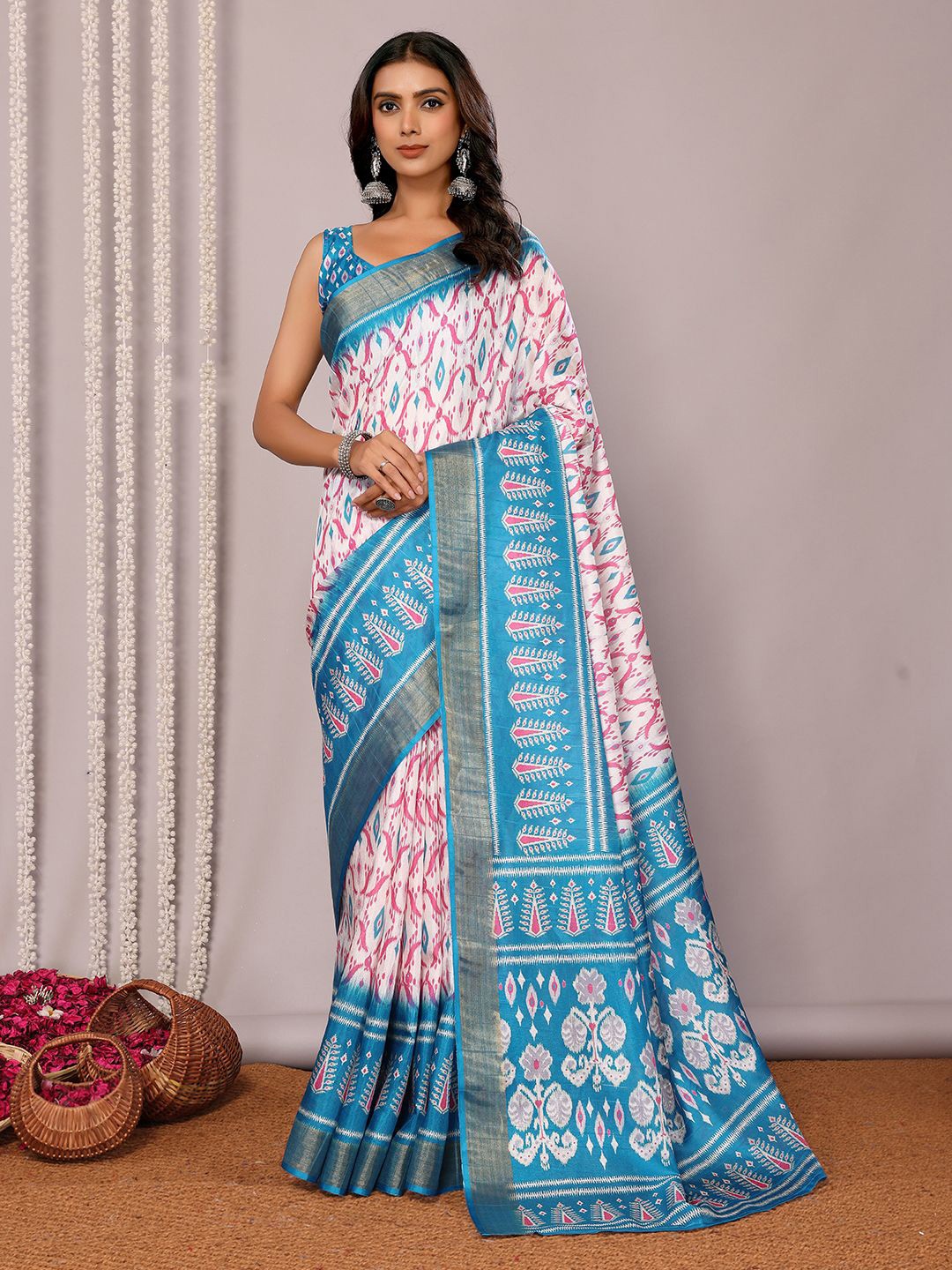 

Janasya Women Blue Chanderi Silk Ikkat Printed Saree with Unstitched Blouse Piece