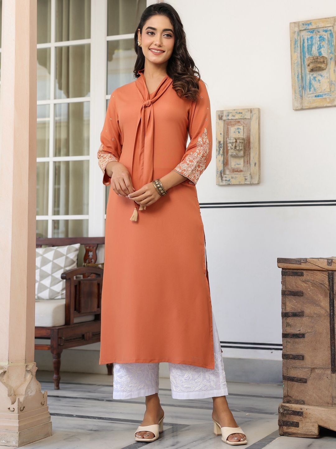 

Janasya Women's Peach Rayon Solid Straight Kurta