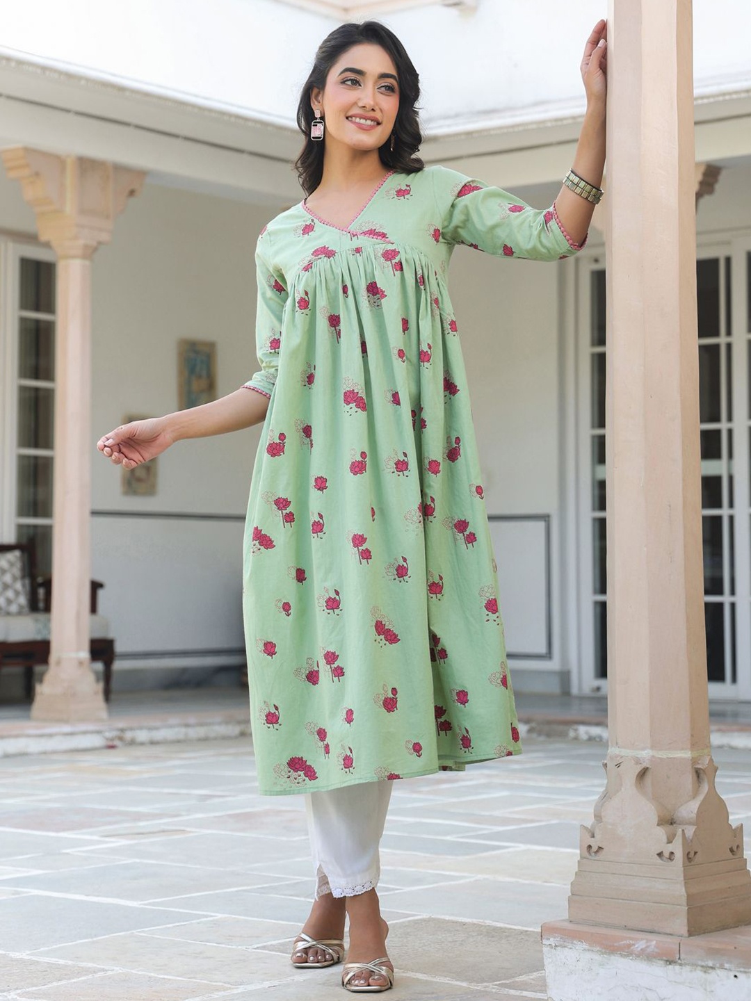 

Janasya Women Sage Green Pure Cotton Botanical Print Flared Kurta