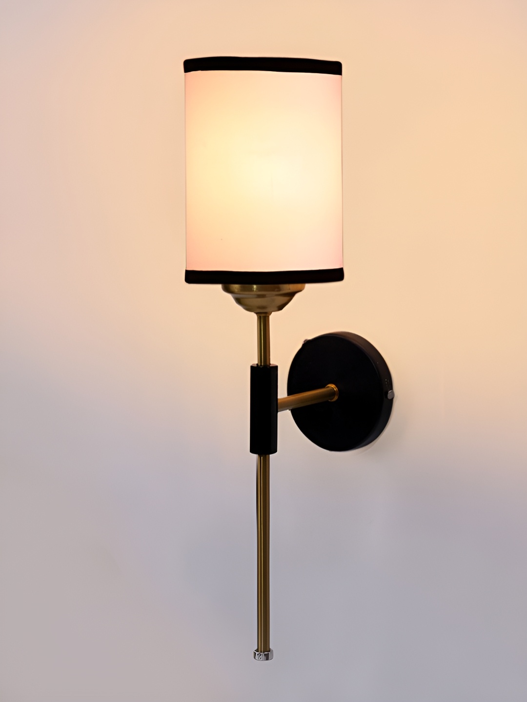 

Devansh White & Black Metal Traditional Cylinder Shaped Wall Lamp