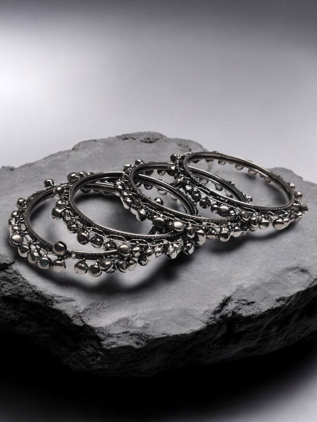 

Sangria Set Of 4 Black Silver Ghungroo Bangles