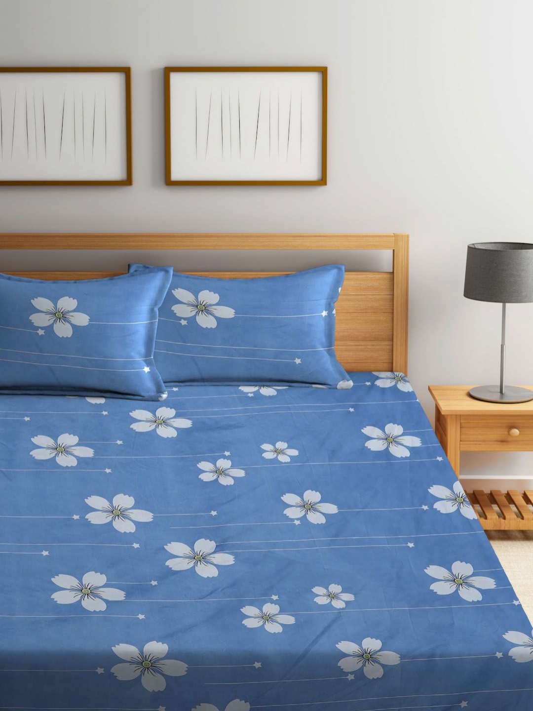 

Myntra Elegant Homes Blue & White Printed 300 TC King Bedsheet Set 2.25 m x 1.50 m