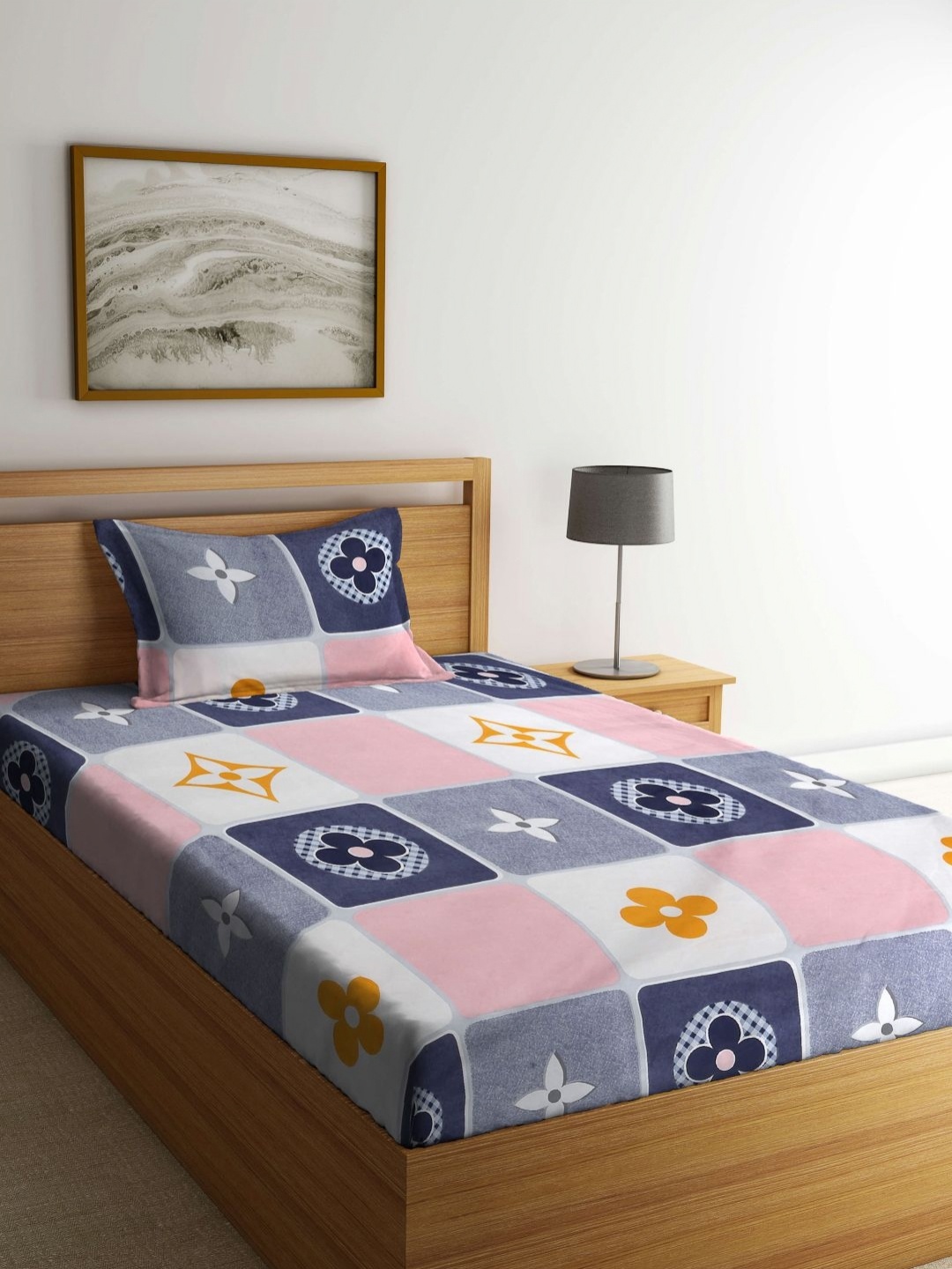

Myntra Elegant Homes Blue & Pink Geometric Printed 300TC Single Bedsheet Set 2.20m x 1.50m