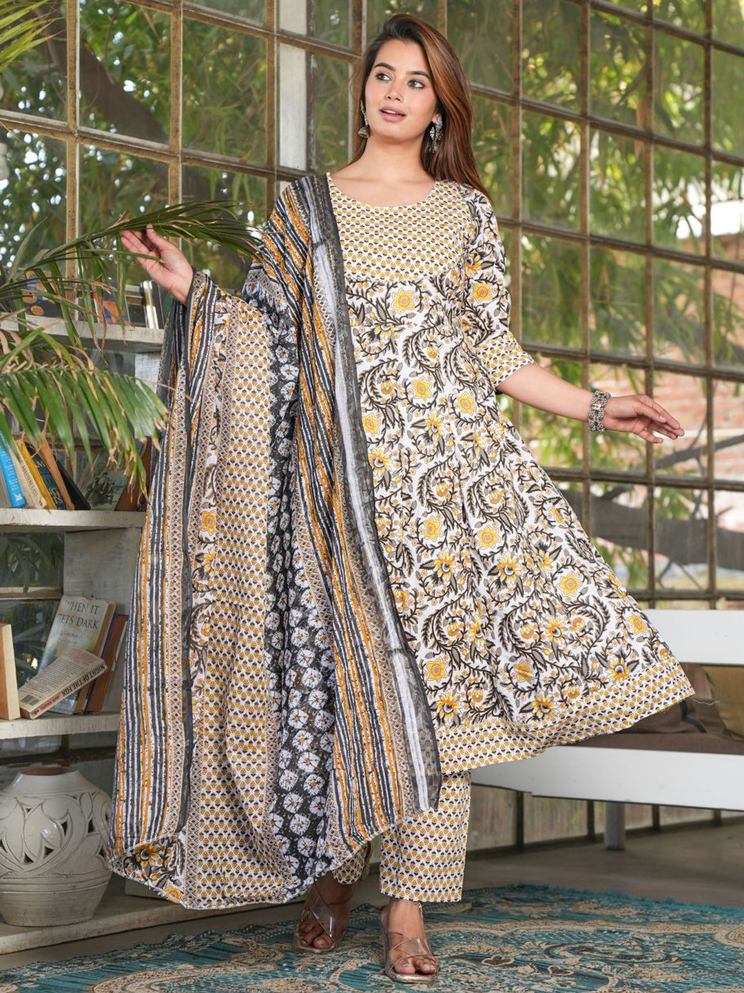 

SINGNI Floral Printed Pure Cotton A-Line Kurta with Trouser & Dupatta, Mustard