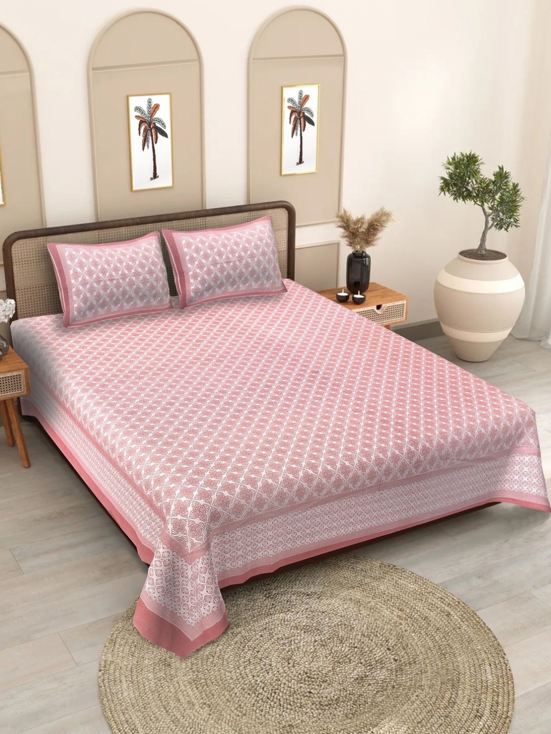 

Texstylers Pink & White Printed Cotton 186 TC Queen Bedsheet Set - 2.20 m X 2.50 m