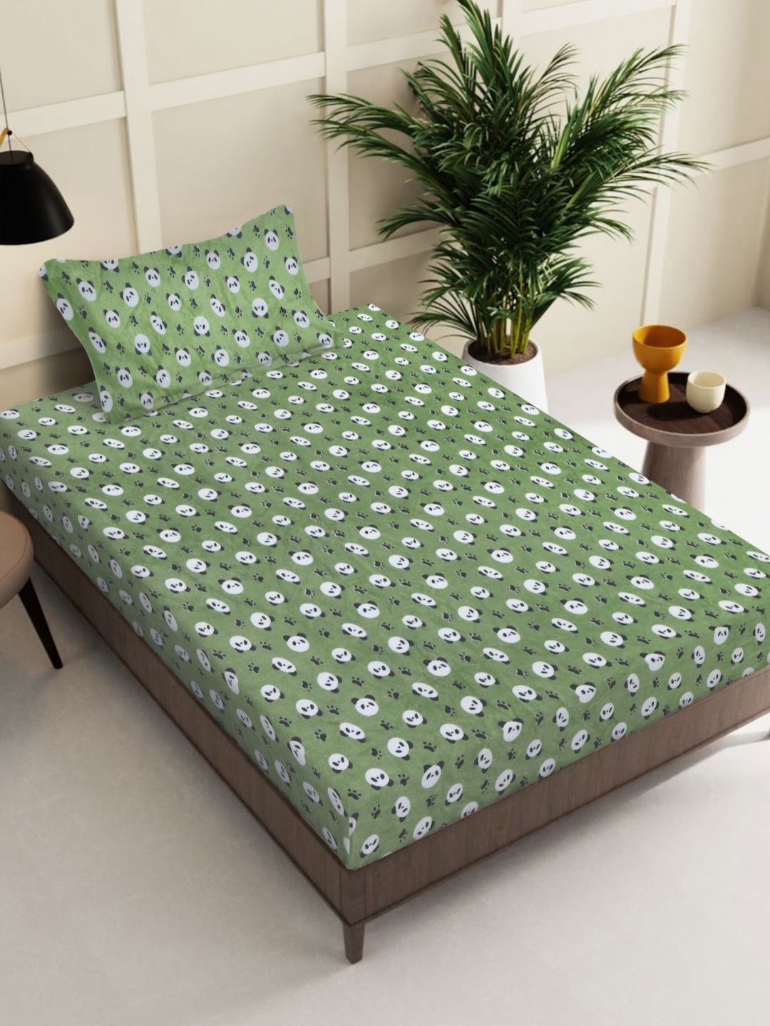 

Myntra Elegant Homes Green Printed Woolen 300 TC Single Bedsheet Set-2.20 m x 1.50 m