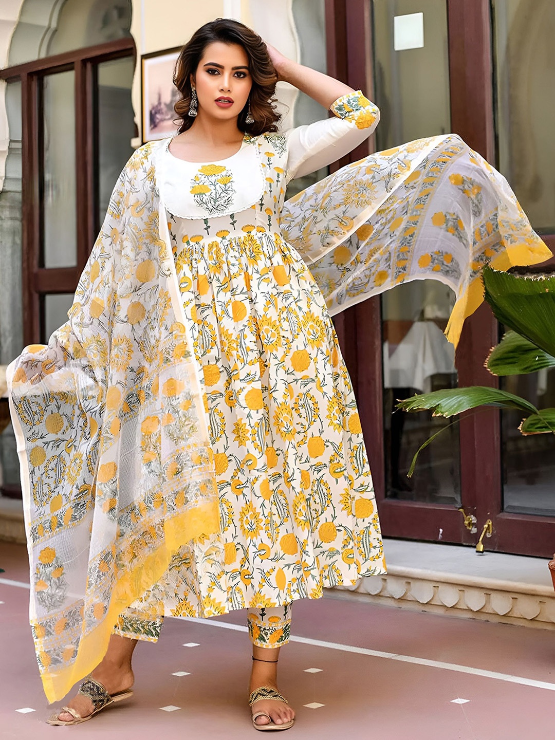 

Shree Infinity Export Floral Printed Anarkali Kurta With Trouser And Dupatta, Yellow