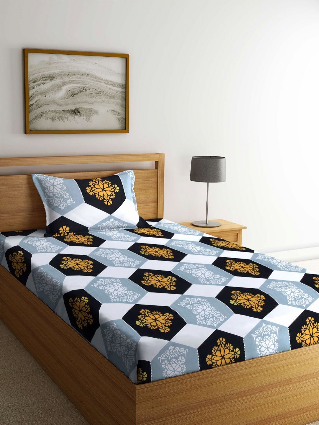 

Myntra Elegant Homes Blue & Black Printed 300 TC Single Bedsheet Set- 220 cm x 150 cm