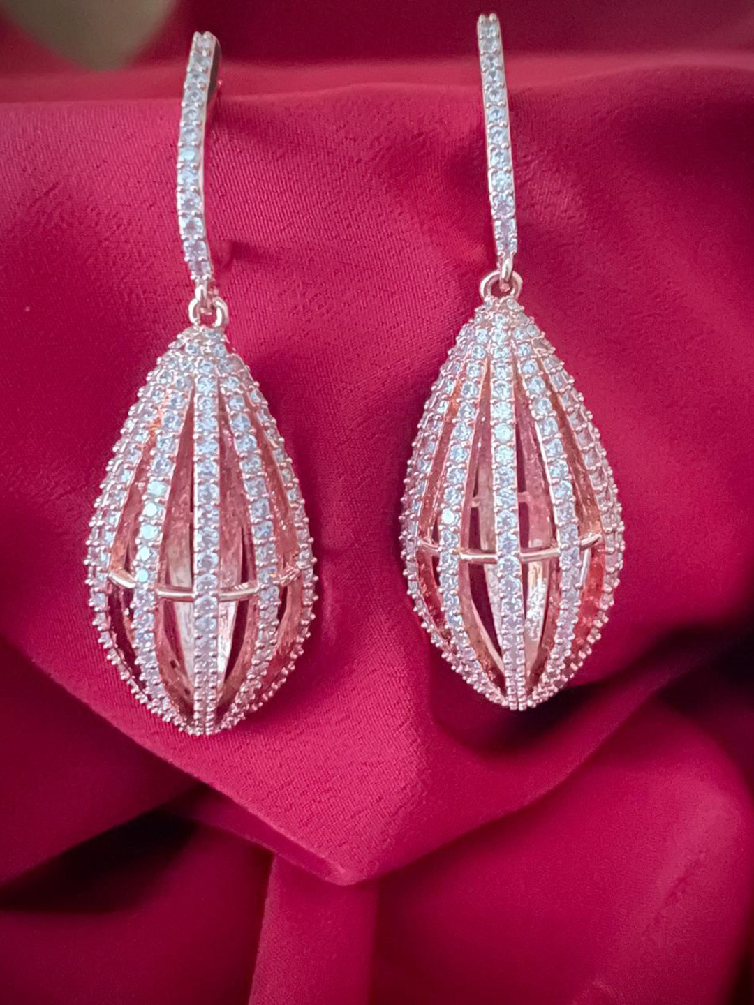 

MONI LIFESTYLE American Diamond Studded Teardrop Shaped Drop Earrings, Rose gold