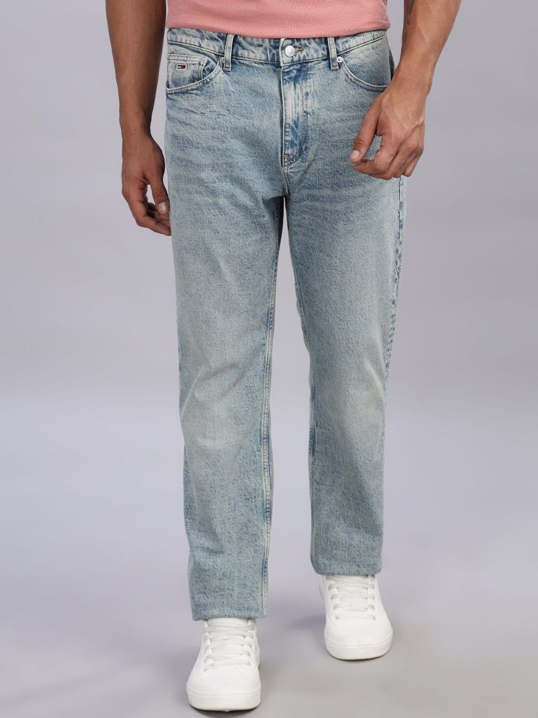 

Tommy Hilfiger Men Slim Fit Low-Rise Light Fade Stretchable Jeans, Blue