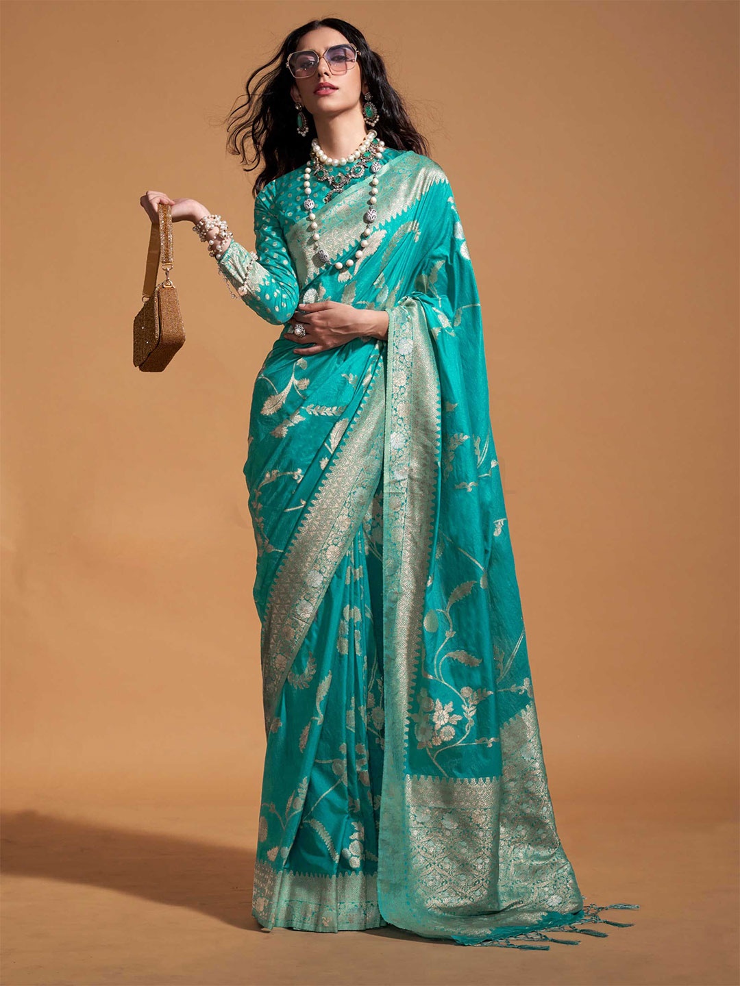 

Vardha Floral Woven Design Zari Pure Georgette Banarasi Saree, Turquoise blue