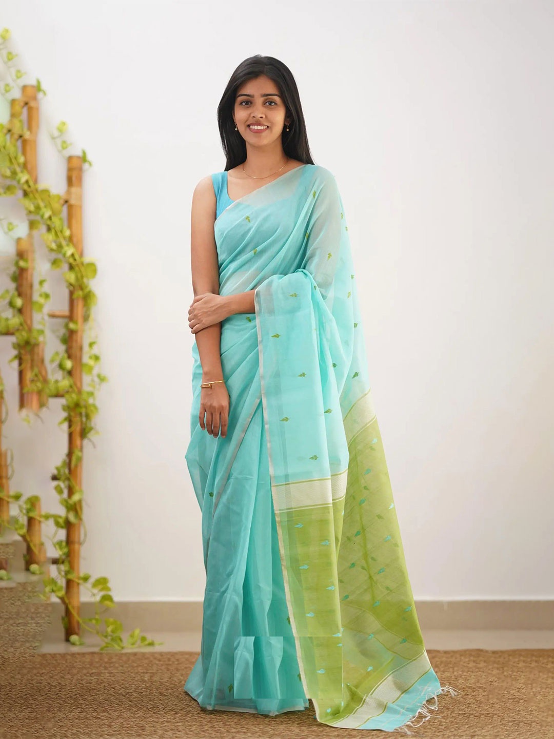 

APNISHA Woven Design Printed Zari Chanderi Saree, Turquoise blue