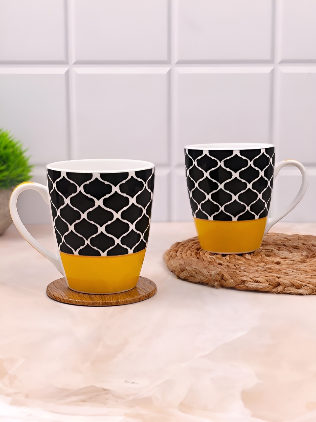 

UPC Black & Yellow 2 Pieces Printed Ceramic Glossy Mugs 280ml