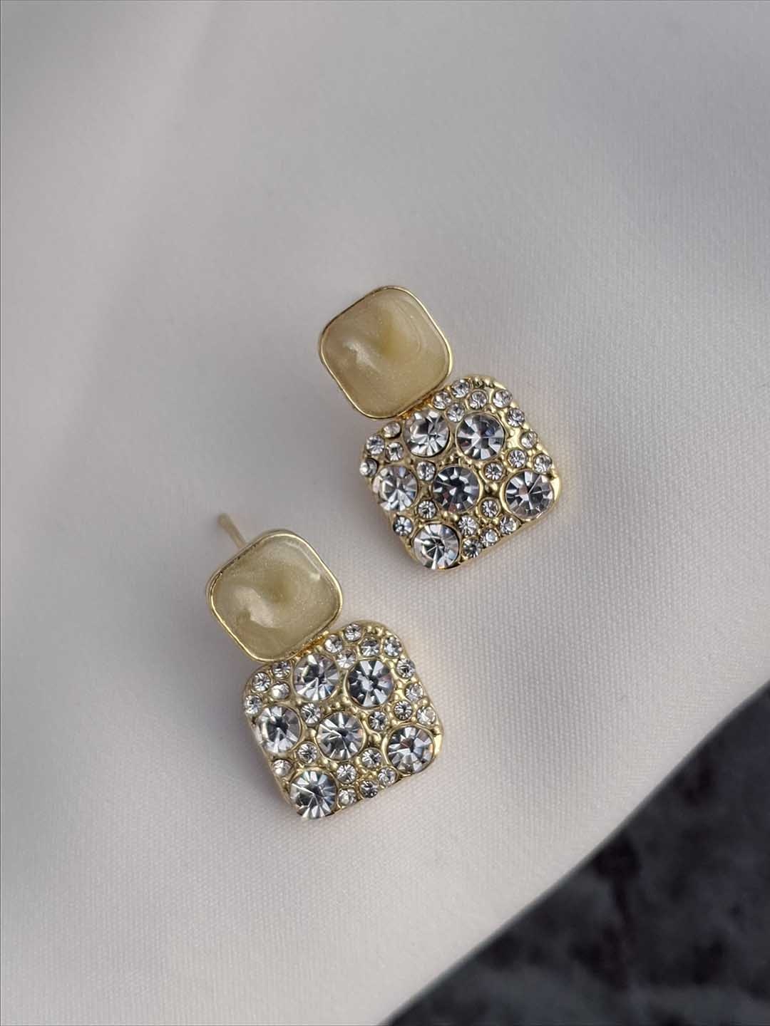 

Zhouse Gold-Plated Crystals Studded Contemporary Drop Earrings