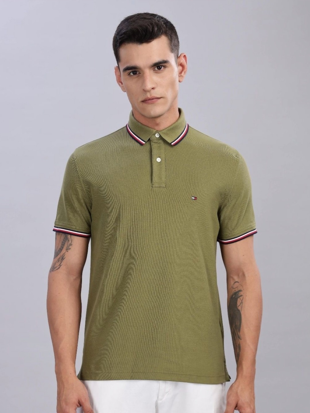

Tommy Hilfiger Men Solid Polo Collar Cotton Regular Fit T-shirt, Olive