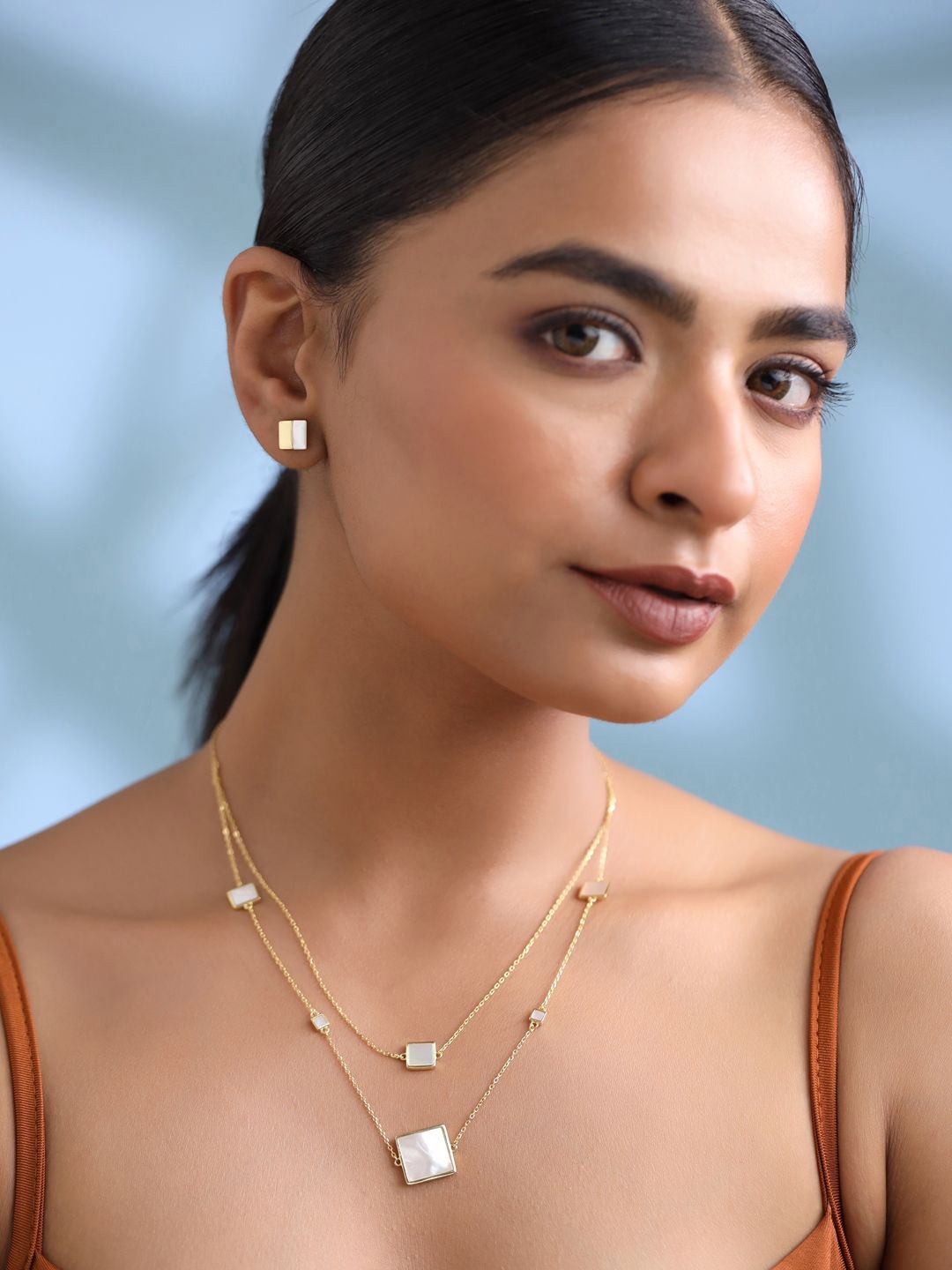 

Kicky And Perky Sterling Silver Gold Plated Mother of Pearls Studded Jewellery Set