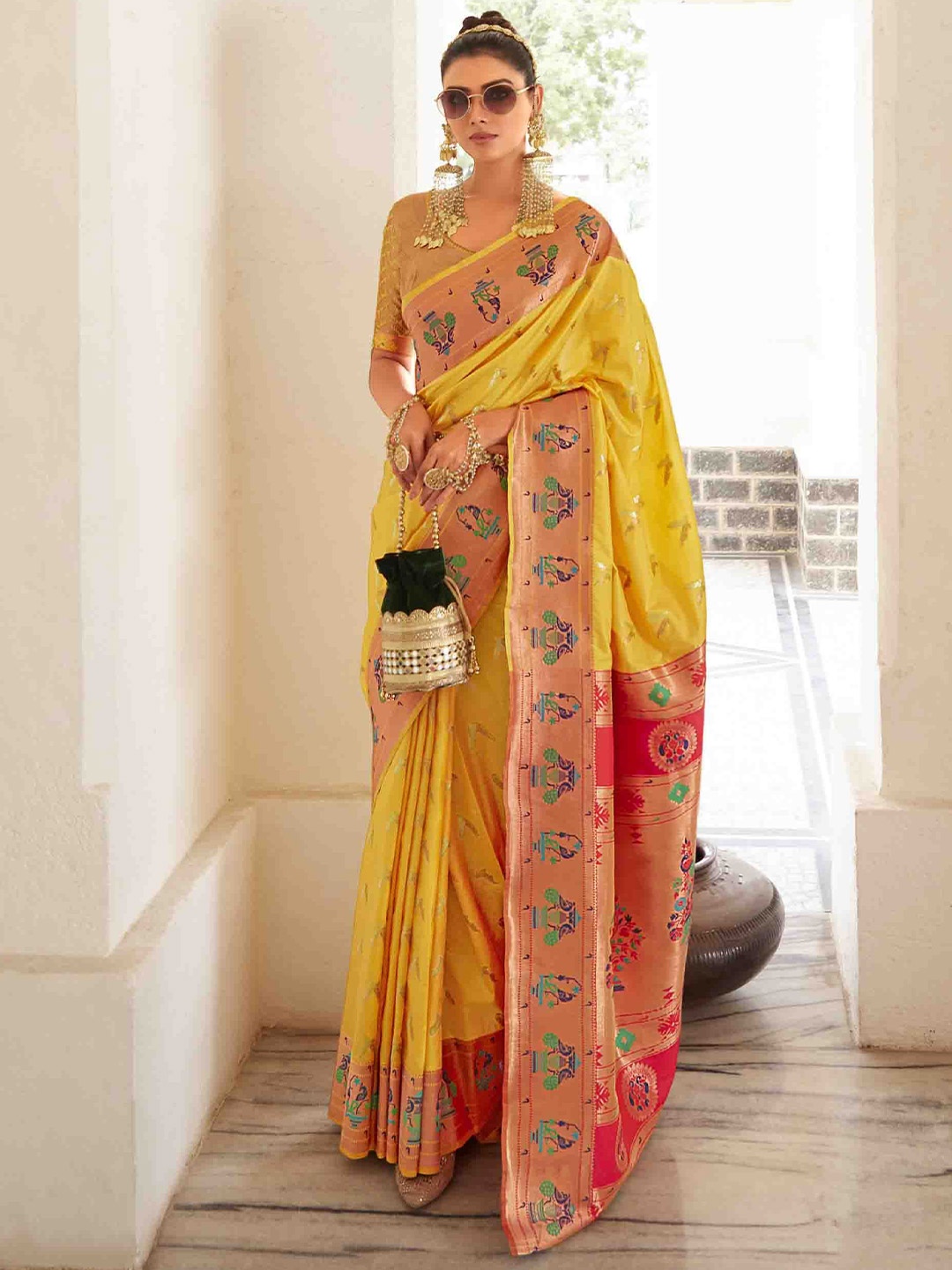 

DIVASTRI Pure Georgette Woven Design Zari Paithani Saree, Yellow