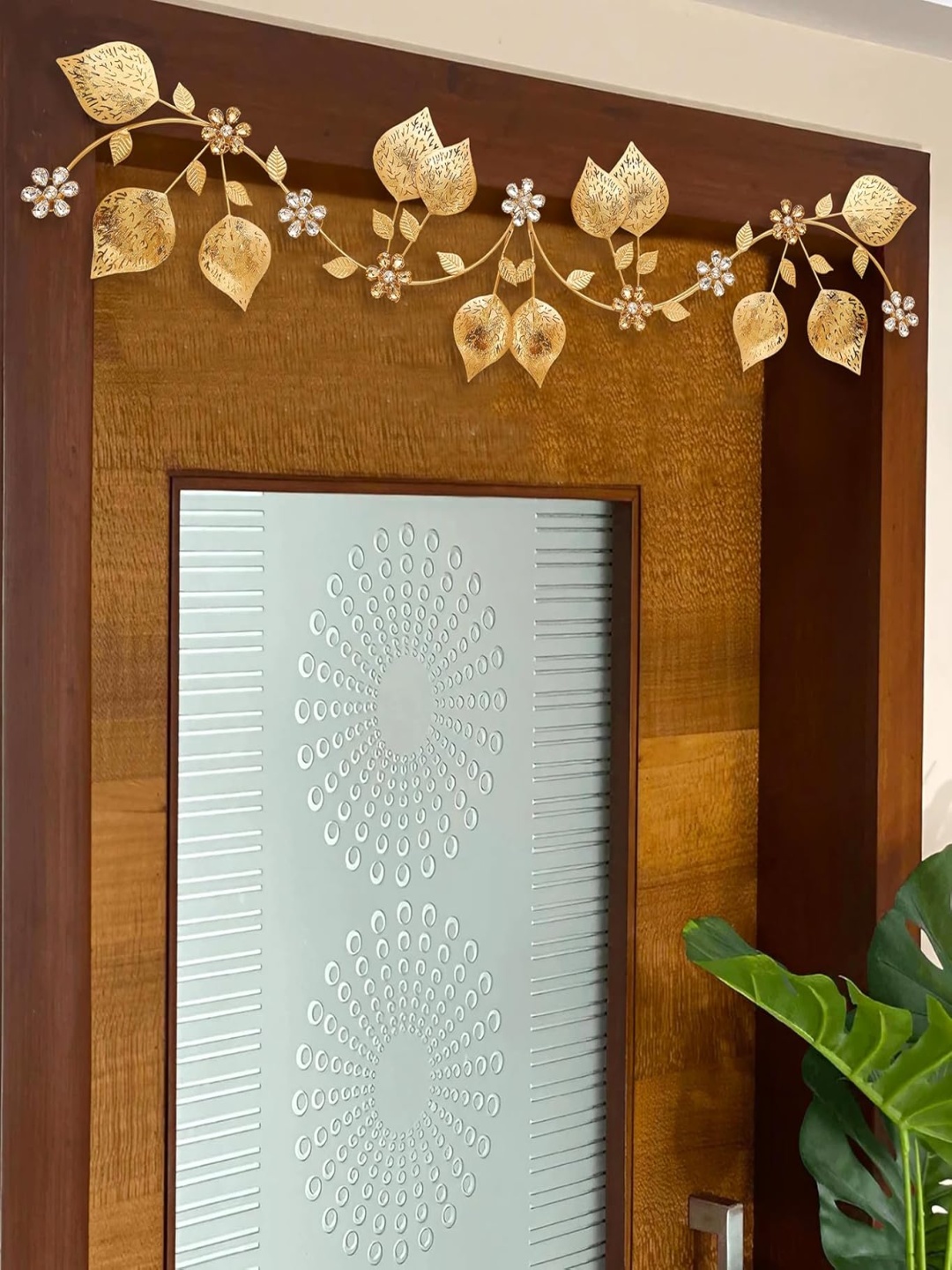 

THE HOME CO. Gold Toned Metal Textured Metal Toran Festive Decor