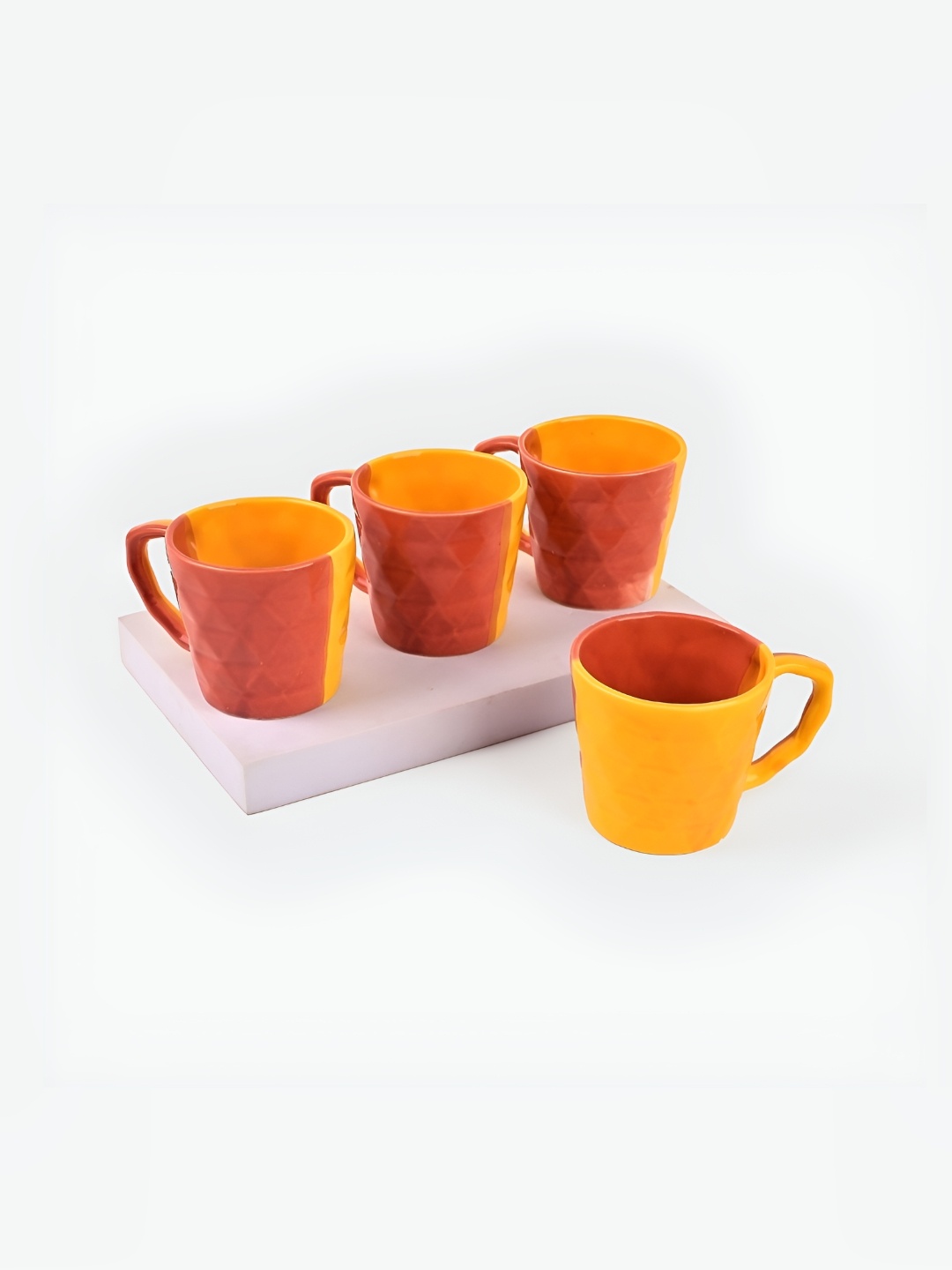 

Storepedia Yellow & Orange 4 Pieces Textured Ceramic Matte Tea Cups