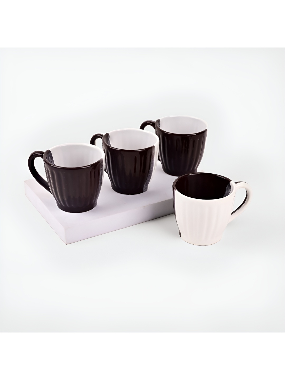 

Storepedia Brown & White 4 Piece Textured Ceramic Matte Cups And Mugs