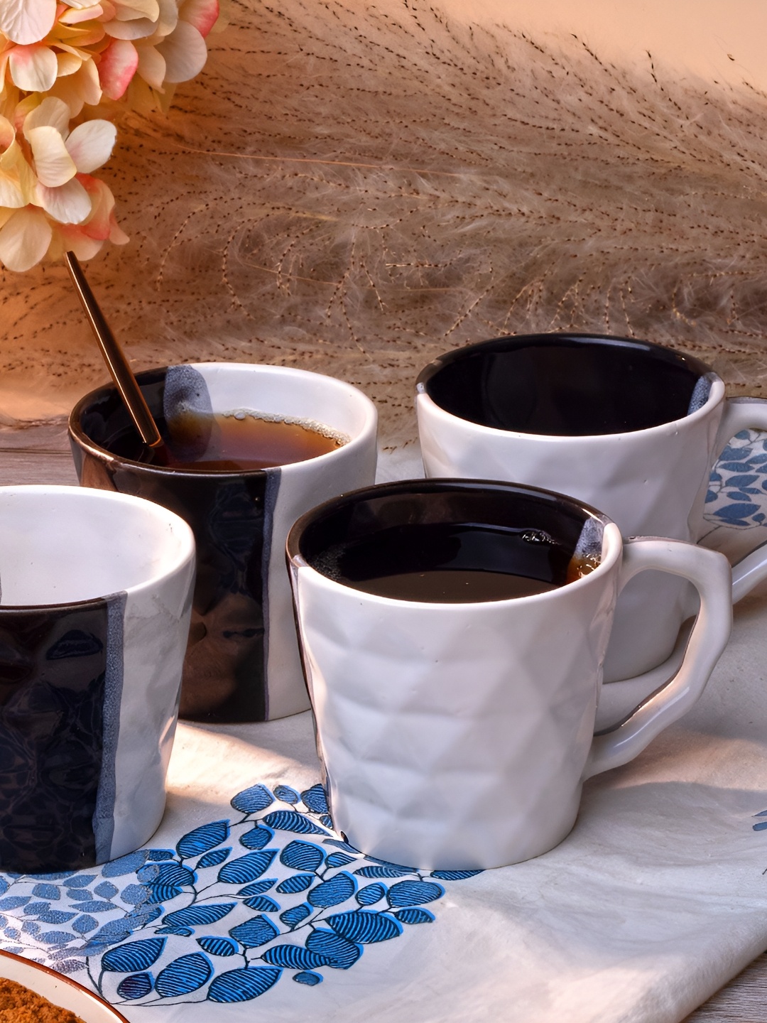 

Storepedia White & Brown 4 Pieces Textured Ceramic Matte Cups 150ml