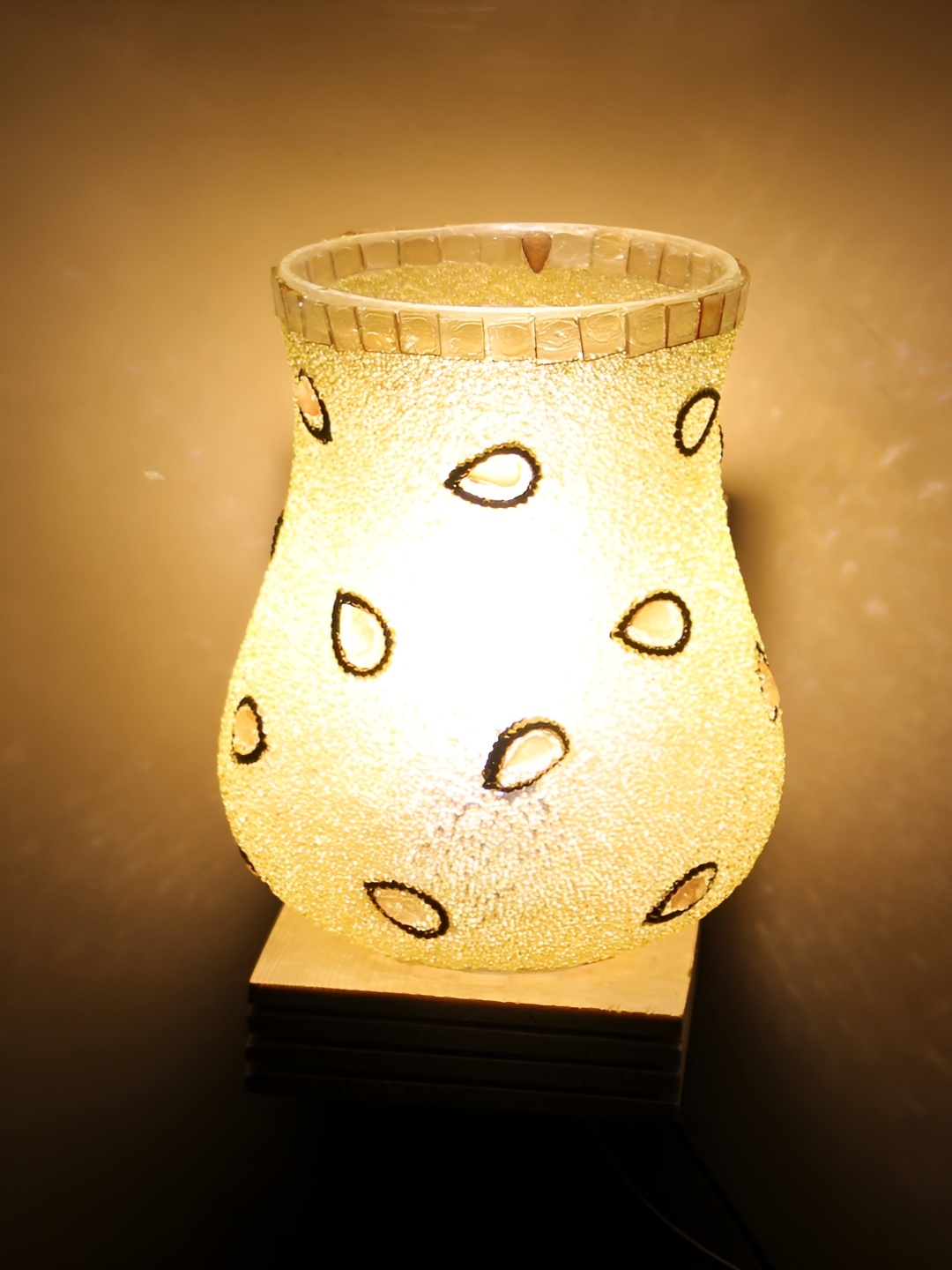 

KINIS Beige Printed Wood Quirky Cylinder Shaped Wall Lamp