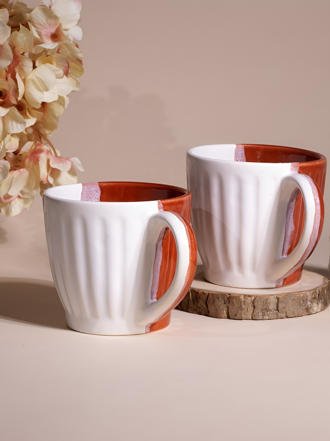 

Storepedia White & Red 2 Pieces Textured Ceramic Matte Cups 150ml Each