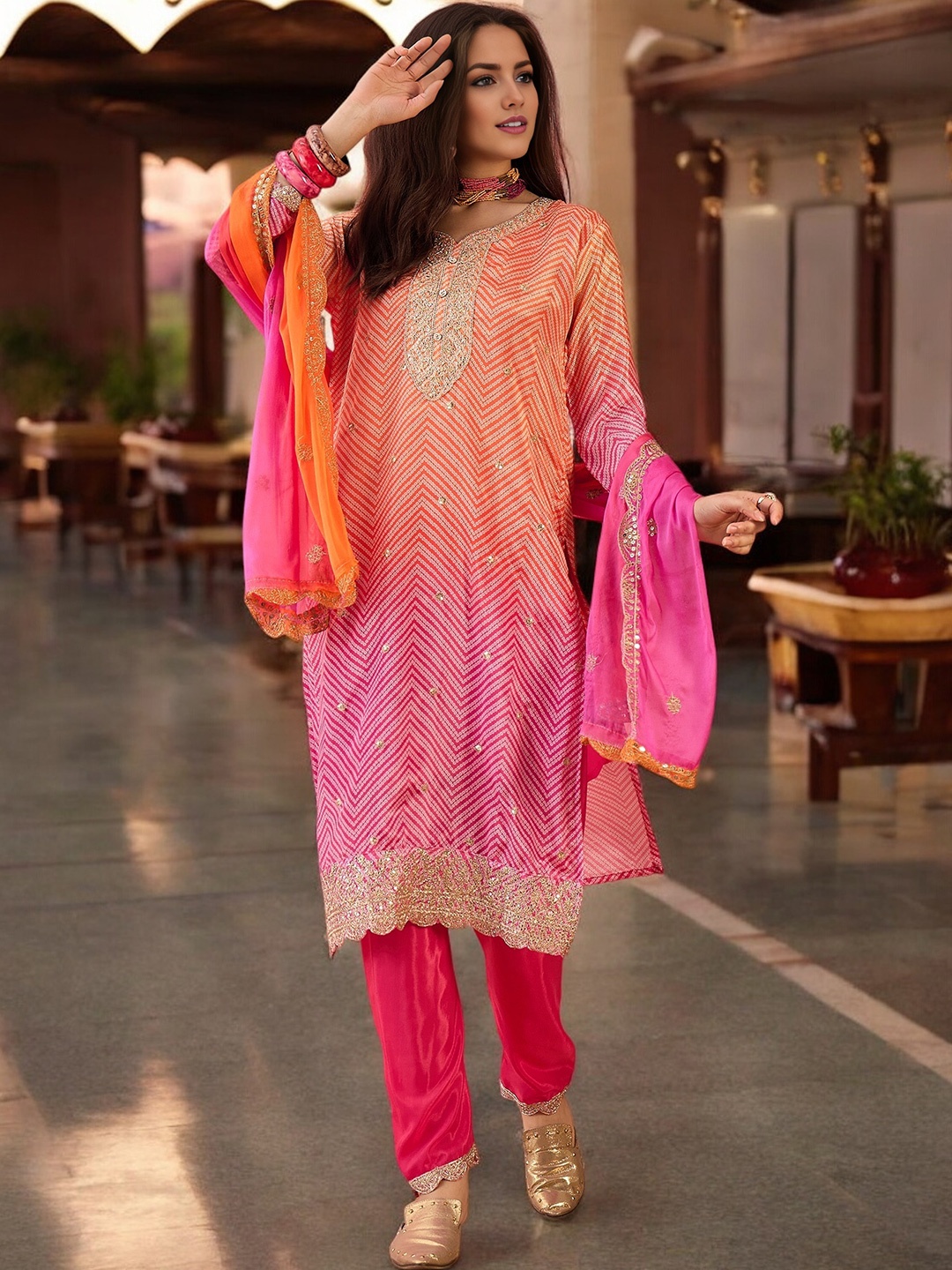 

KALINI Bandhani Printed Sequinned Round Neck Straight Kurta With Trousers And Dupatta, Orange